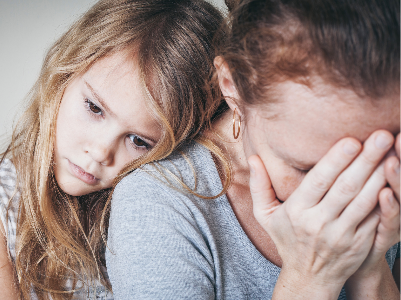 sad girl and mom