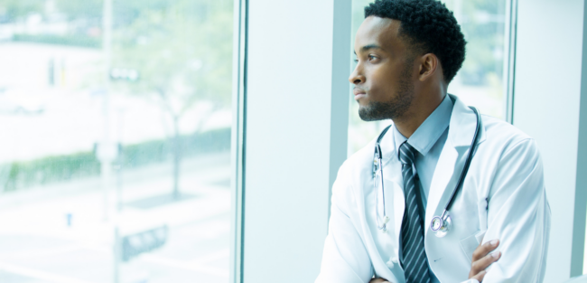 doctor looking out window