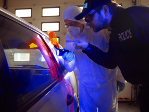 officers investigating a car