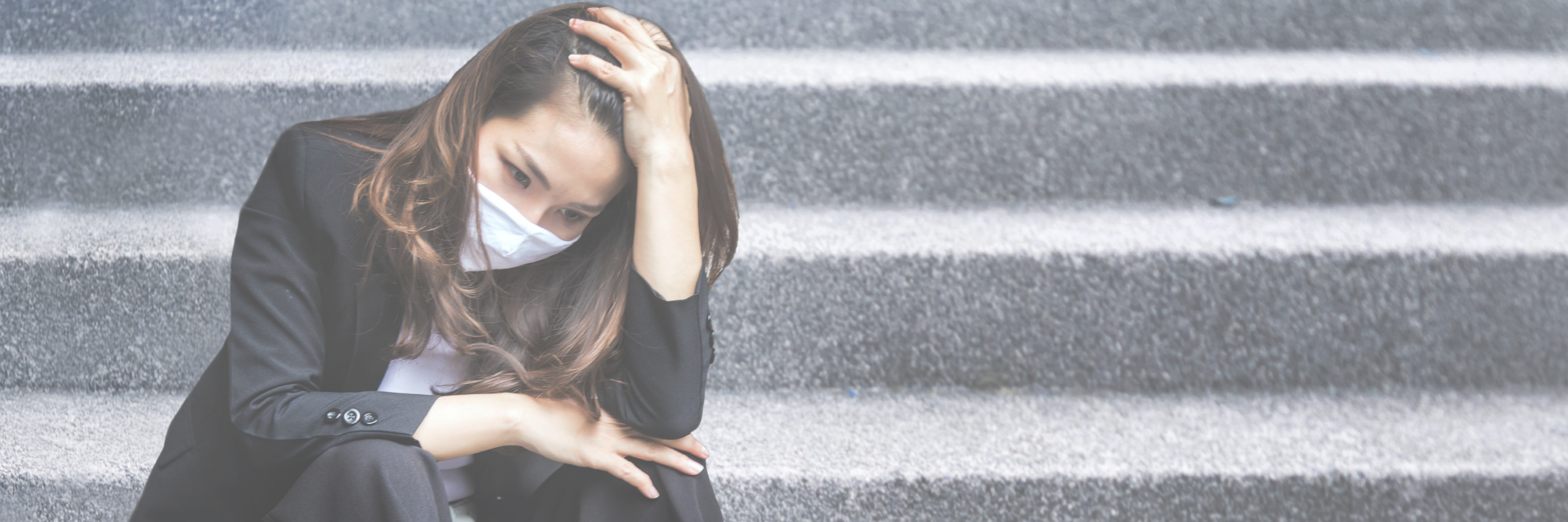 woman on steps frustrated about work