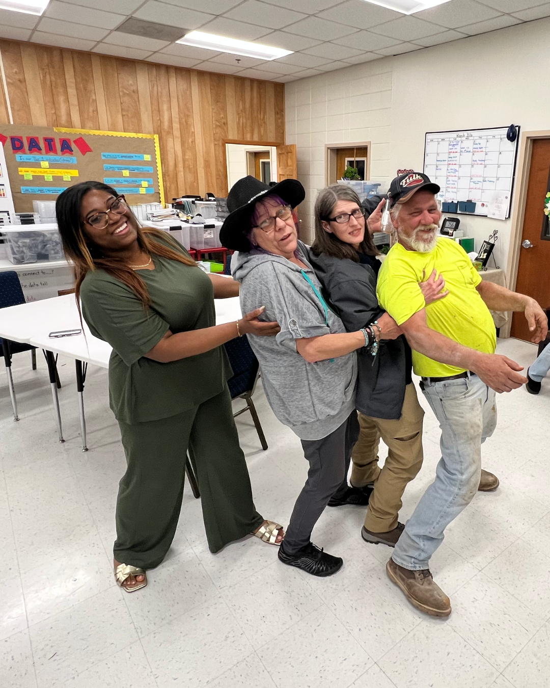 During an RHCK workshop, Shaneika led parents and caregivers in an activity that drove home the importance of teaching children to lean on others for support.