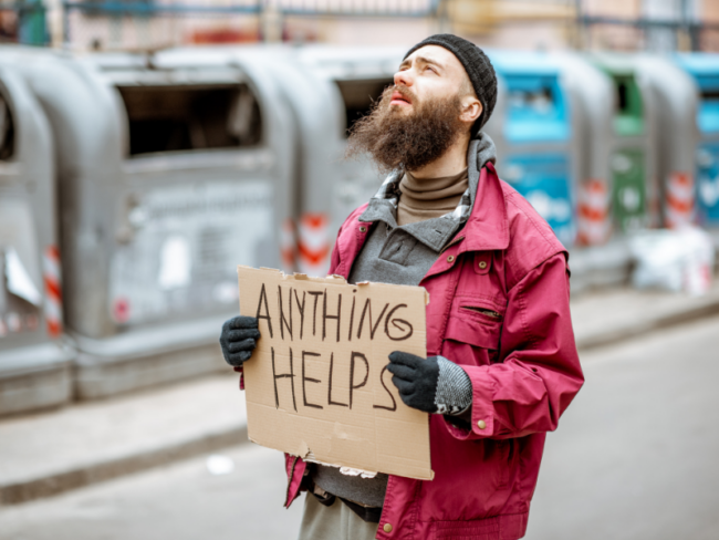 impoverished man with anything helps sign