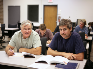 2 men in a training class