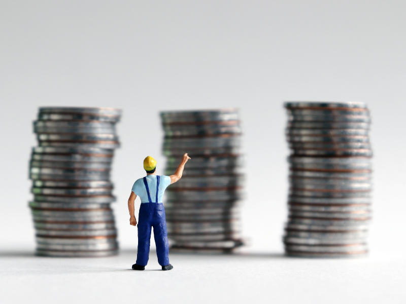 worker and coin stacks