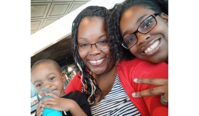 Neicee, Kadence, and Kendall smile for the camera.